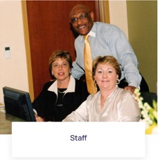 Larry Hales with staff members