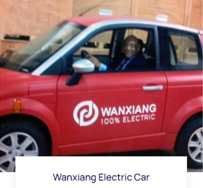 Larry Hales driving a Wanxiang 100% electric car